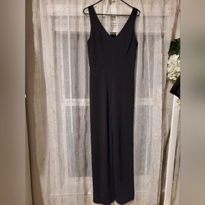 Black jumpsuit with pockets.